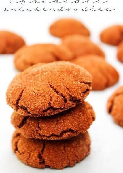 Chocolate Snickerdoodles stacked up on a plate.