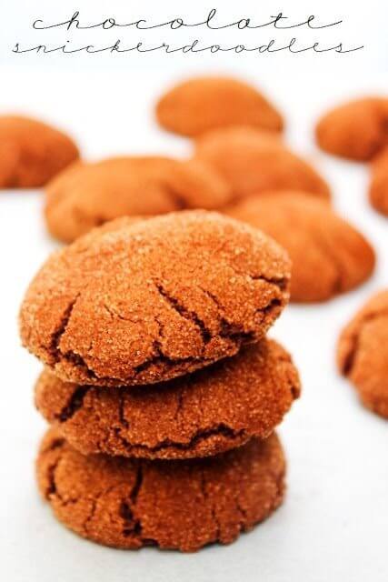 Chocolate Snickerdoodles stacked up on a plate.