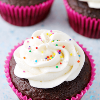 Simple Vanilla Buttercream Frosting with rainbow sprinkles.