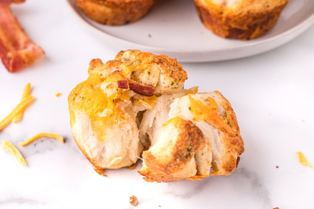 close up of a cheddar bacon ranch pull apart roll
