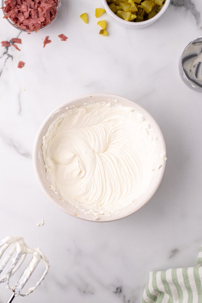 Smooth and creamy mixture of cream cheese and sour cream after blending