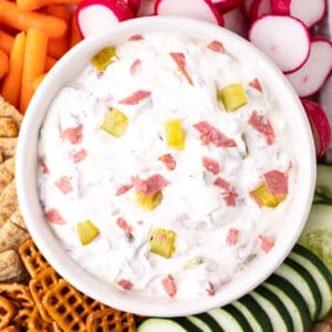 looking down on a closeup of dill pickle wrap dip in white bowl