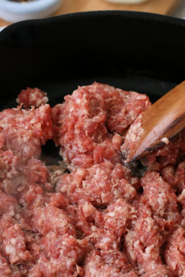 brown and crumble the pork in a skillet