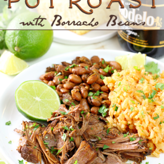 Mexican Pot Roast with Borracho Beans and Mexican rice on a plate with a lime.