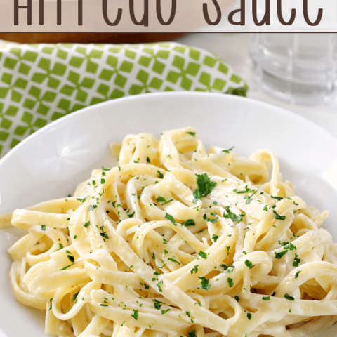 Homemade Alfredo Sauce in a white bowl.