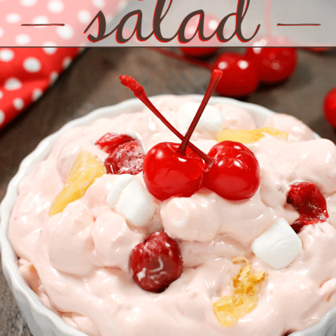 Cherry Chiffon Salad in a white bowl with cherries.