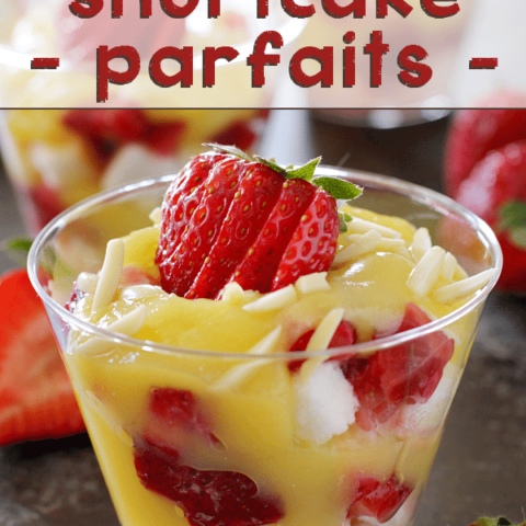 Strawberry Shortcake Parfaits in a glass with fresh fruit.