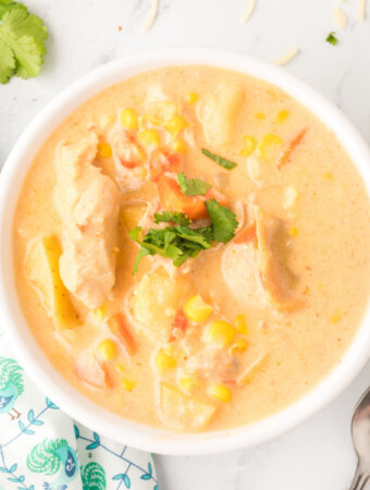 looking down into a bowl of mexican chicken & corn chowder