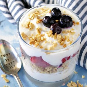 Your family will love waking up to this Fruit and Yogurt Breakfast Parfait recipe. Yogurt is topped with fruit and granola for an easy breakfast idea.