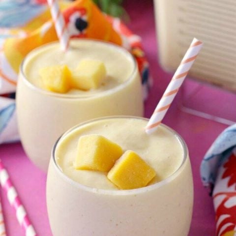 Start your day off with this delicious Sunshine Smoothie with Banana and Mango.This quick and easy recipe will brighten your morning.