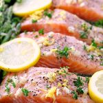 Sheet Pan Lemon, Garlic & Herb Salmon with Asparagus on a plate.