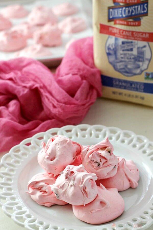 Jello Divinity on a white plate with a bag of Dixie Crystals Pure Cane Sugar.