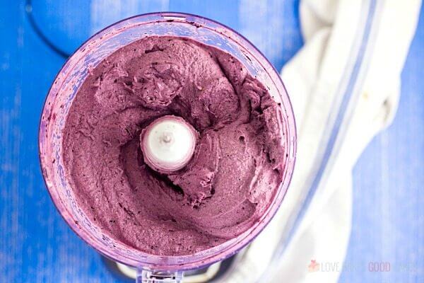 Blueberry Banana Smoothie Bowl ingredients in a blender after mixing.