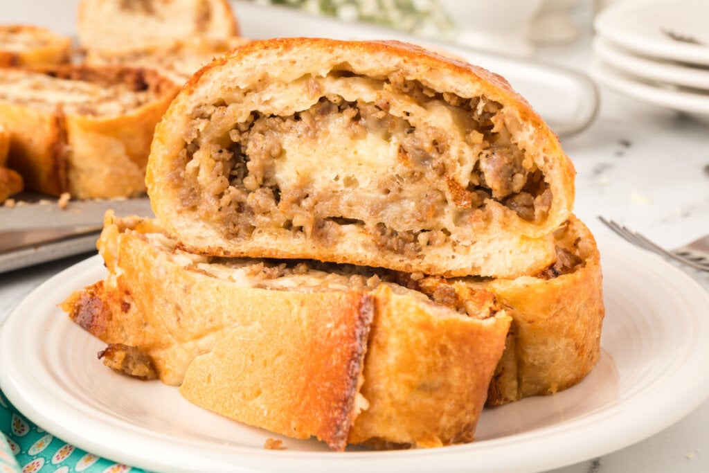 three slices of sausage bread on plate