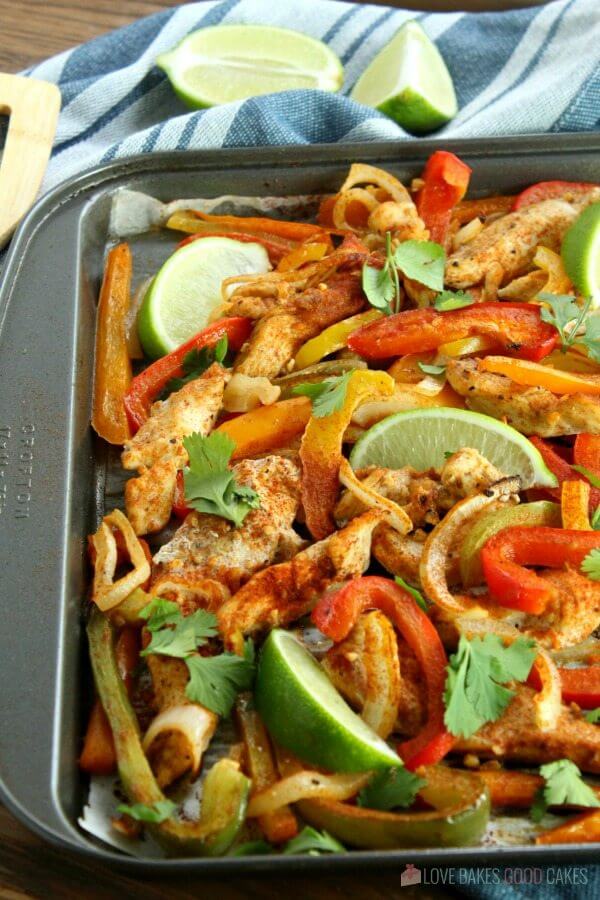 Get dinner on the table quickly with this Sheet Pan Chicken Fajitas recipe! Tender strips of chicken, bell pepper, and onion mingle in a tantalizing array of Mexican flavors. Serve with your favorite garnishments and (an optional) Margarita!