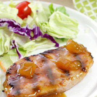 Dinner is easy AND delicious when these Dijon-Peach Pork Chops are on the menu! You only need a handful of ingredients and less than 30 minutes!