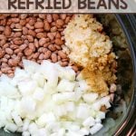 This Slow Cooker Refried Beans recipe is so easy to make! It's the perfect addition to - or side dish for - all of your Mexican dishes.