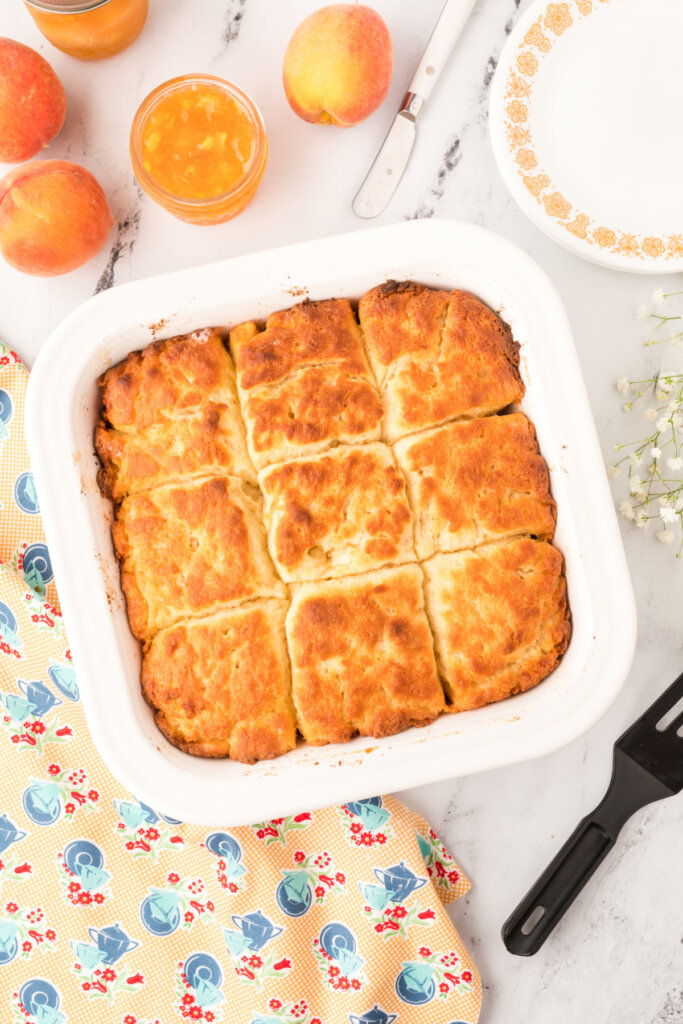 looking down onto a pan with baked butter dip biscuits