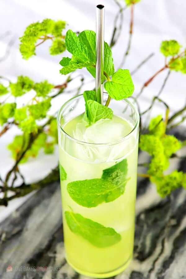 Pineapple Mojito (with Virgin "Nojito" Option) in a glass with a straw.