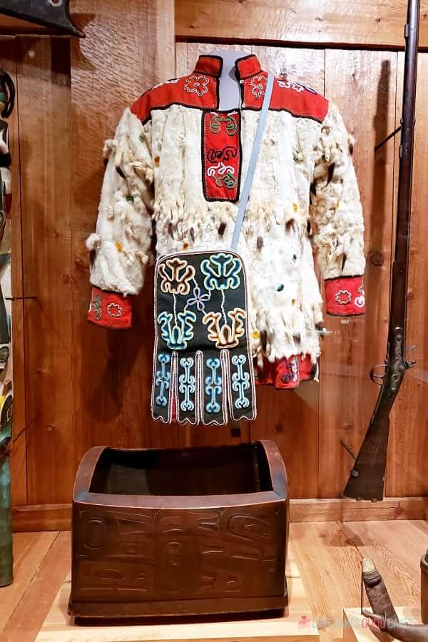 An exhibit of a Native American article of clothing in a museum in Juneau Alaska.
