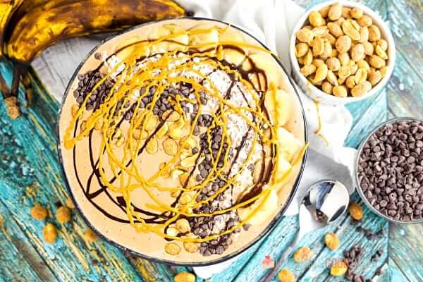 Chocolate Peanut Butter Smoothie Bowl with bananas and toppings.