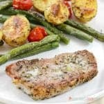When you need to make mealtime quick and easy, give this Italian Pork Chop Sheet Pan Dinner a try! Italian-spiced Pork Chops bake with potatoes, green beans, and tomatoes for a supper everyone will love!