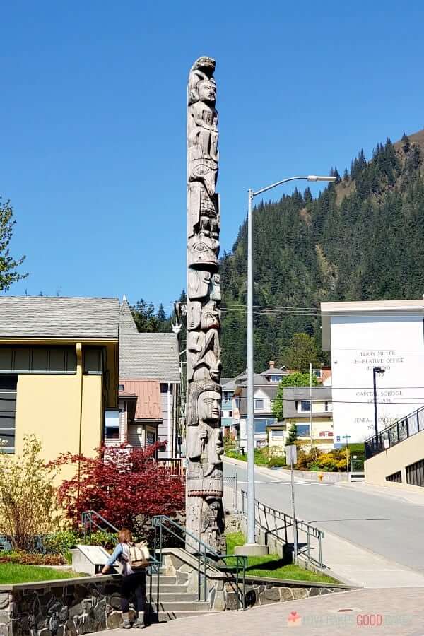 A totem pole stands in the City of Juneau Alaska.