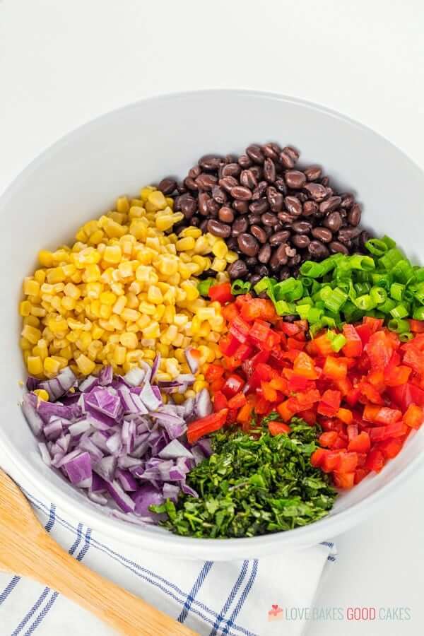 Black Bean and Corn Salsa ingredients in a white bowl.