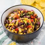 Whether for your summer party or for your next game day tailgate, this Black Bean and Corn Salsa is the perfect appetizer when served with some tortilla chips! Also great served over fish, chicken, pork, and beef as a salsa. 
