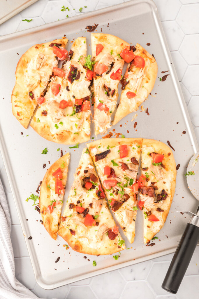 chicken bacon ranch flatbread on baking sheet