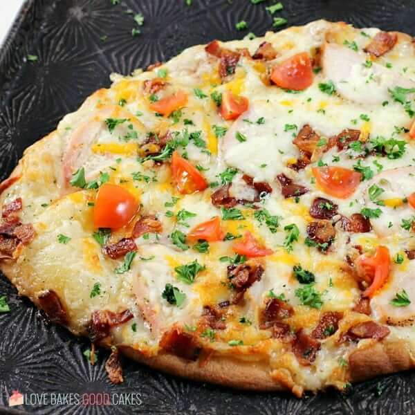 Add a new favorite to pizza night with this Chicken Bacon Ranch Naan Bread Pizza! This flavor combo pairs well on naan bread and makes the perfect pizza idea!