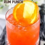 This Orange and Pineapple Rum Punch is the perfect adults-only refreshment on a hot summer day! Let the tropical flavors melt the stress away!