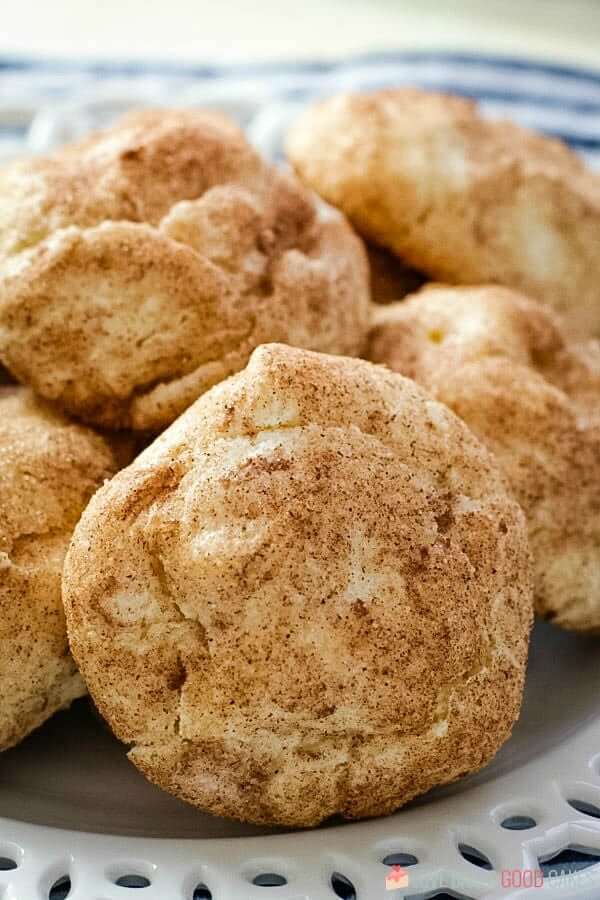 Snickerdoodle Cream Cheese Cookies piled on a white plate close up.