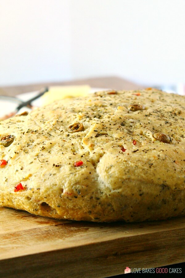 Bread laying on a cutting board.