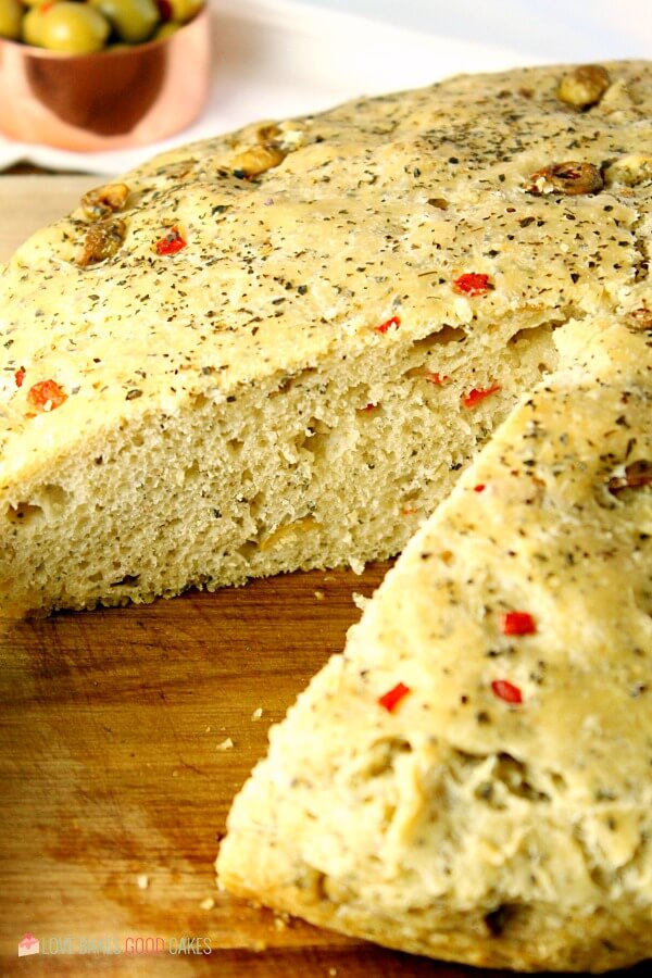 https://www.lovebakesgoodcakes.com/wp-content/uploads/2018/10/No-Knead-Skillet-Olive-Bread-8a.jpg