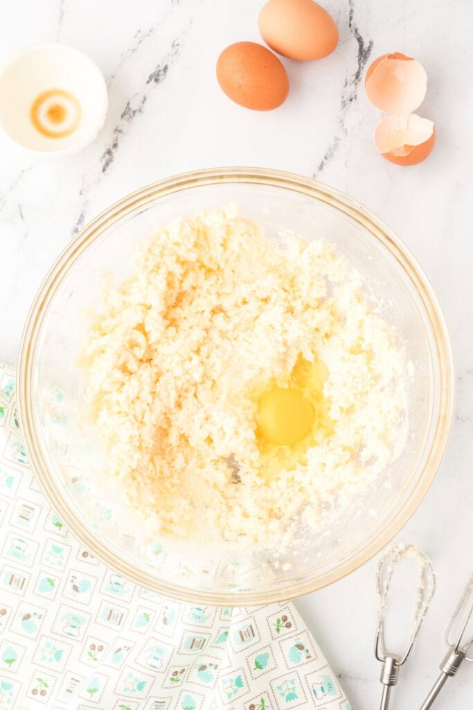 First egg added to creamed butter and sugar for Chocolate Milk Cake batter