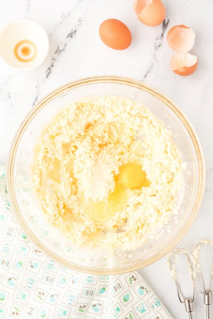 Mixing the egg into the butter and sugar mixture for Chocolate Milk Cake