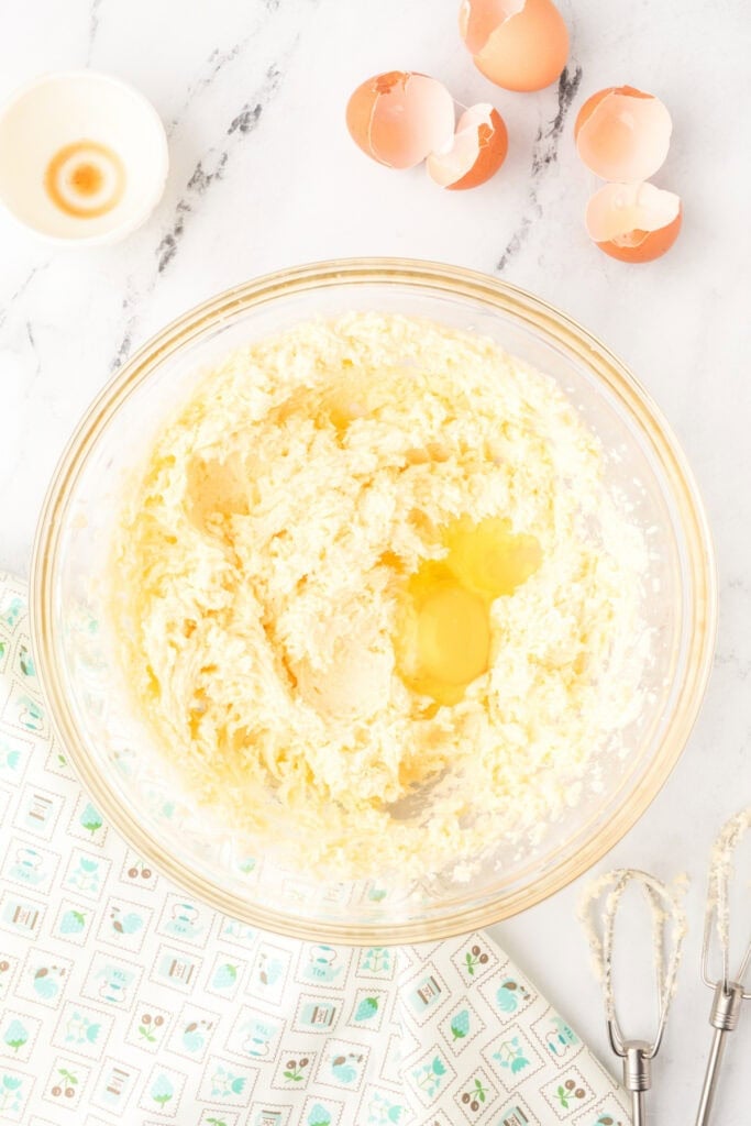 Eggs added to the creamed butter mixture for Chocolate Milk Cake batter