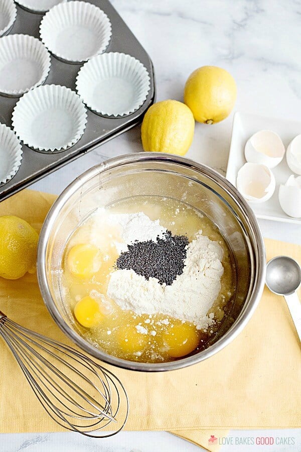 Lemon Poppy Seed Muffin ingredients in a metal mixing bowl.