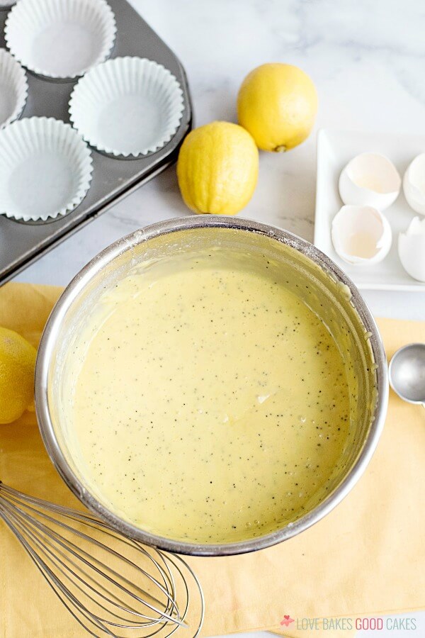 Lemon Poppy Seed Muffin ingredients mixed up in a metal mixing bowl.