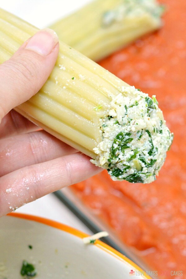 Manicotti shells stuffed with spinach ricotta cheese mixture