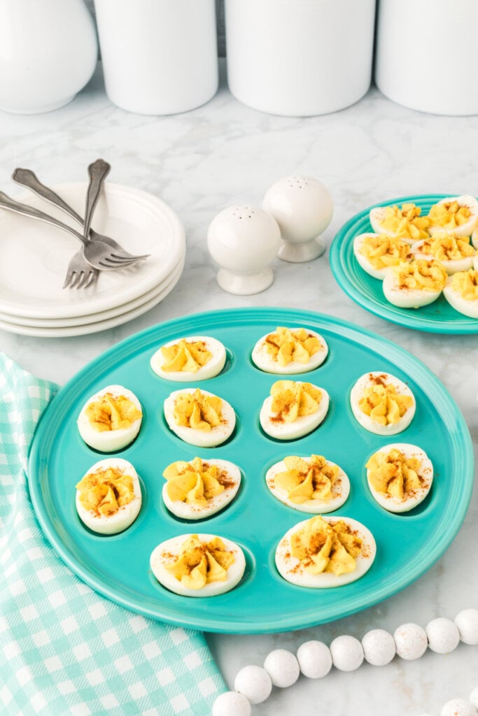 deviled eggs on teal platter