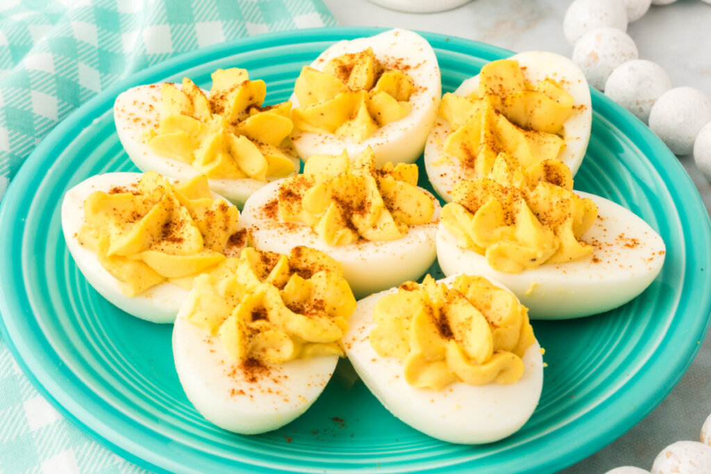 deviled eggs on teal colored plate