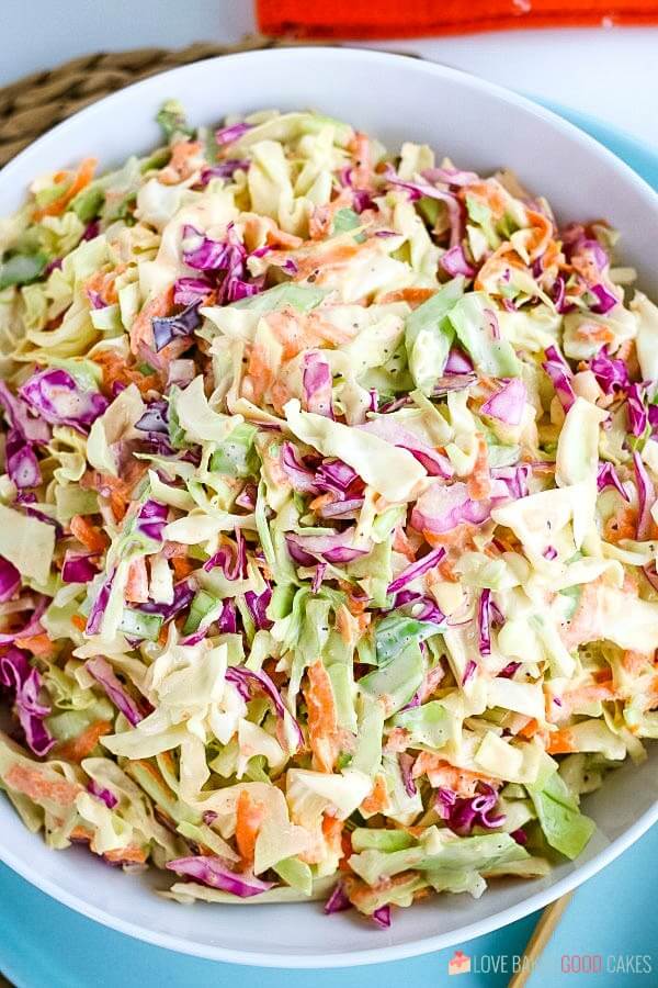 This Coleslaw Dressing has the perfect balance between tangy and sweet. Pour it over pre-shredded cabbage or use your own mix of cabbage and carrots for the perfect side dish any time! coleslaw in a bowl