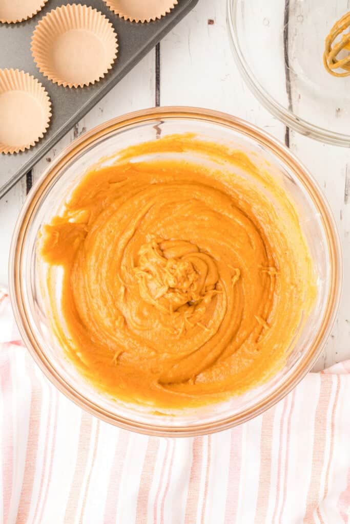 Combined pumpkin batter in a mixing bowl after fully mixing