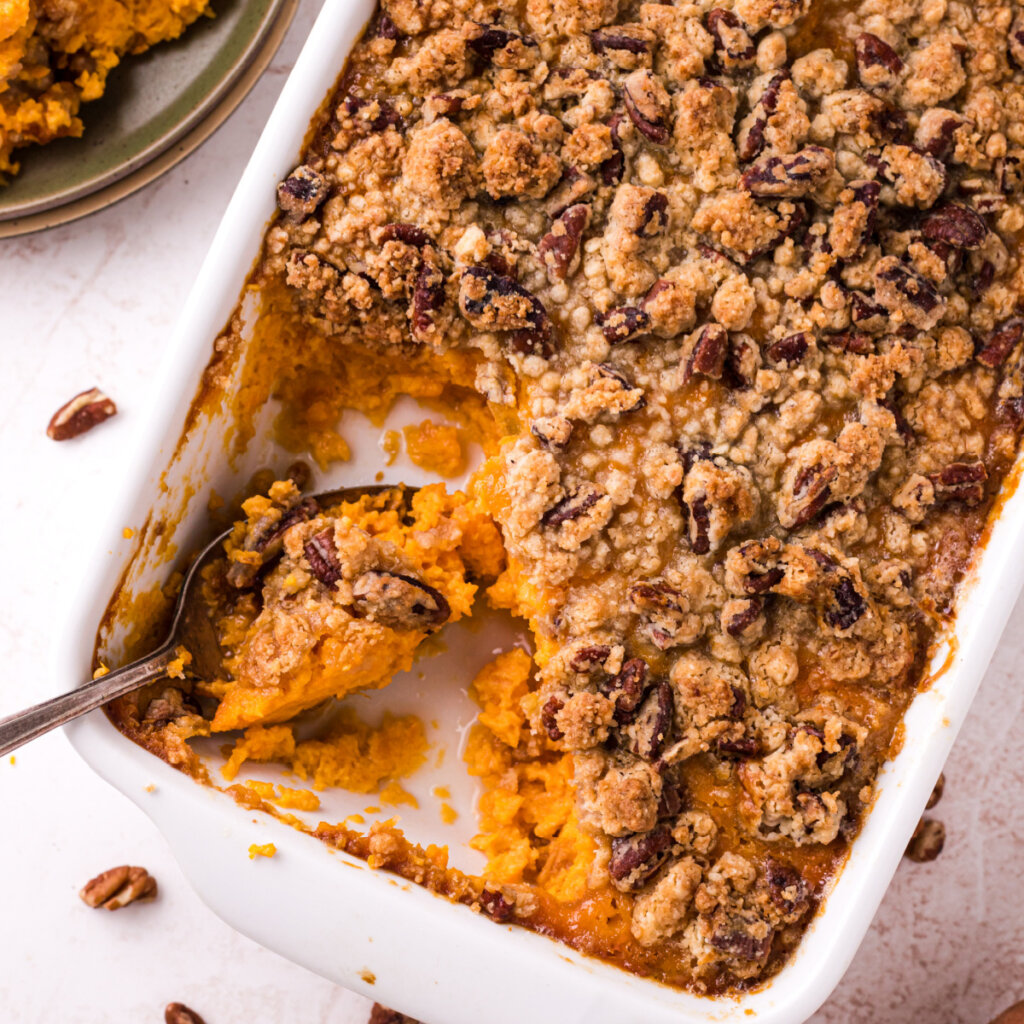 sweet potato casserole with a spoon in the dish