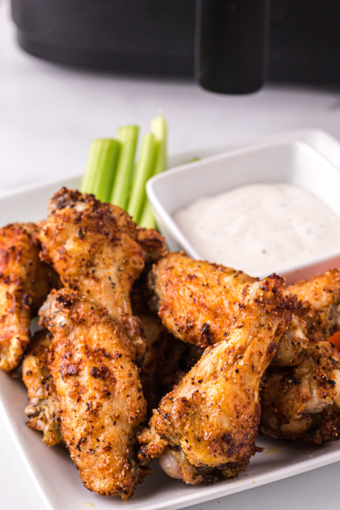 air fryer chicken wings serves with carrots, celery, and dip