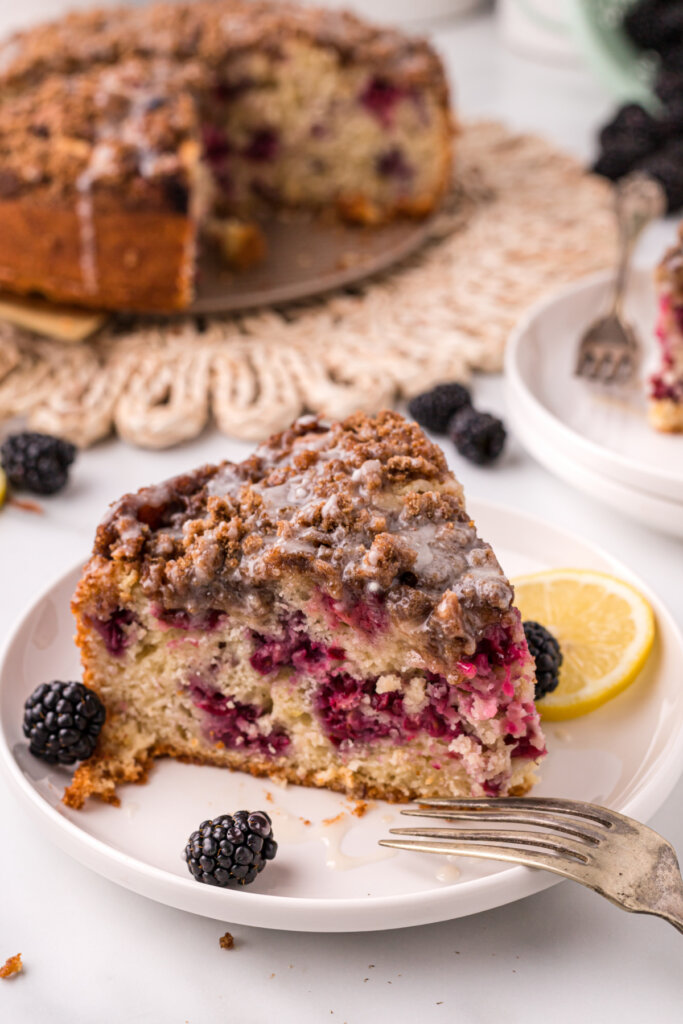 slice of blackberry lemon coffee cake on plate