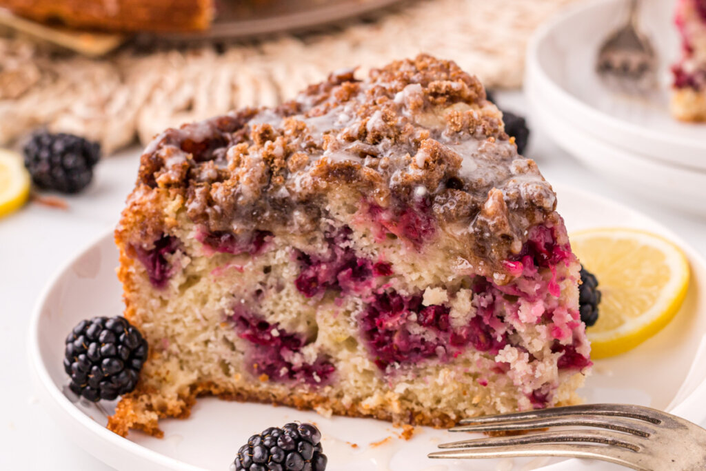 slice of blackberry lemon coffee cake on plate