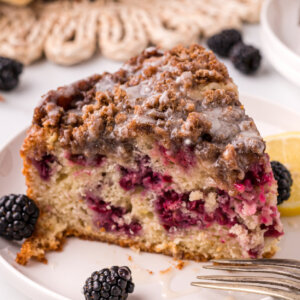 slice of blackberry lemon coffee cake on plate